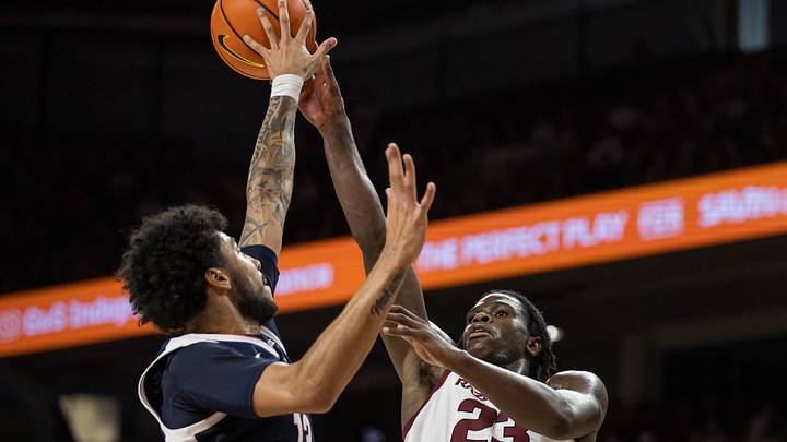 Oct 24, 2026; Fayetteville, AK, USA;  Gonzaga Bulldogs forward Izan Almansa (13) blocks a shot by Arkansas Razorbacks guard Jordan Smith Jr. (23) during the first half at Bud Walton Arena.  Mandatory Credit: Brett Rojo-Imagn Images