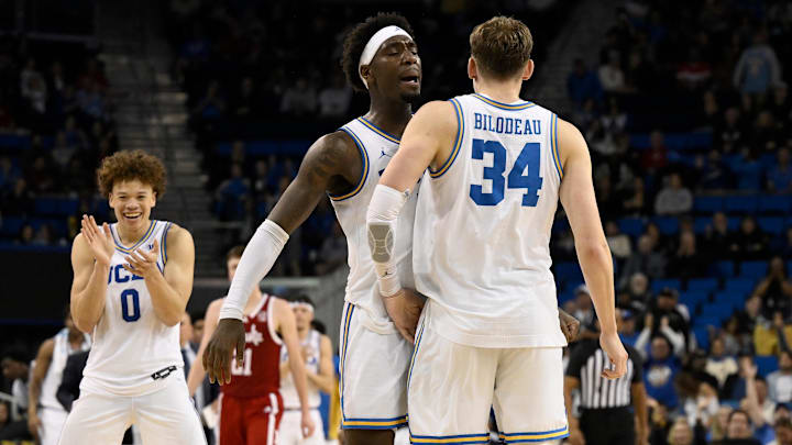 Mar 3, 2026; Los Angeles, California, USA; UCLA Bruins forward Tyler Bilodeau (34) chest dumps teammate Eric Dailey Jr. (3) after hitting a 3-point shot during the second} half at Pauley Pavilion presented by Wescom Financial. Mandatory Credit: Robert Hanashiro-Imagn Images Mar 3, 2026; Los Angeles, California, USA; UCLA Bruins forward Tyler Bilodeau (34) chest dumps teammate Eric Dailey Jr. (3) after hitting a 3-point shot during the second} half at Pauley Pavilion presented by Wescom Financial. Mandatory Credit: Robert Hanashiro-Imagn Images