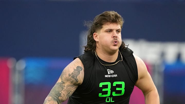 Mar 2, 2025; Indianapolis, IN, USA; Georgia offensive lineman Tate Ratledge (OL33) during the 2025 NFL Scouting Combine at Lucas Oil Stadium. Mandatory Credit: Kirby Lee-Imagn Images Mar 2, 2025; Indianapolis, IN, USA; Georgia offensive lineman Tate Ratledge (OL33) during the 2025 NFL Scouting Combine at Lucas Oil Stadium. Mandatory Credit: Kirby Lee-Imagn Images