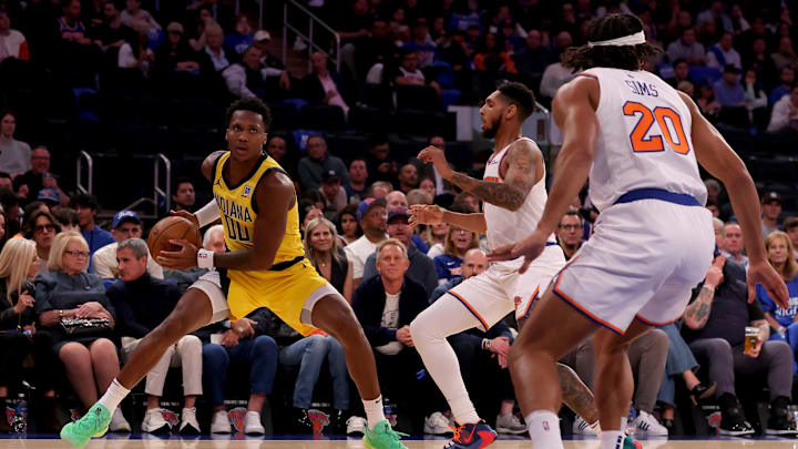 Oct 25, 2024; New York, New York, USA; Indiana Pacers guard Bennedict Mathurin (00) looks to shoot the ball against New York Knicks guard Cameron Payne (1) and center Jericho Sims (20) during the second quarter at Madison Square Garden. Mandatory Credit: Brad Penner-Imagn Images Oct 25, 2024; New York, New York, USA; Indiana Pacers guard Bennedict Mathurin (00) looks to shoot the ball against New York Knicks guard Cameron Payne (1) and center Jericho Sims (20) during the second quarter at Madison Square Garden. Mandatory Credit: Brad Penner-Imagn Images