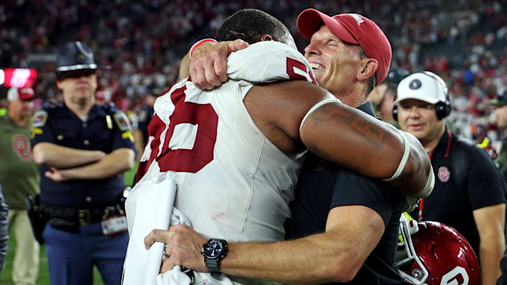 Nov 15, 2025; Tuscaloosa, Alabama, USA;  Oklahoma Sooners head coach Brent Venables celebrates with defensive lineman Gracen Halton (56) after Oklahoma defeated the Alabama Crimson Tide 23-21 at Saban Field at Bryant-Denny Stadium. 