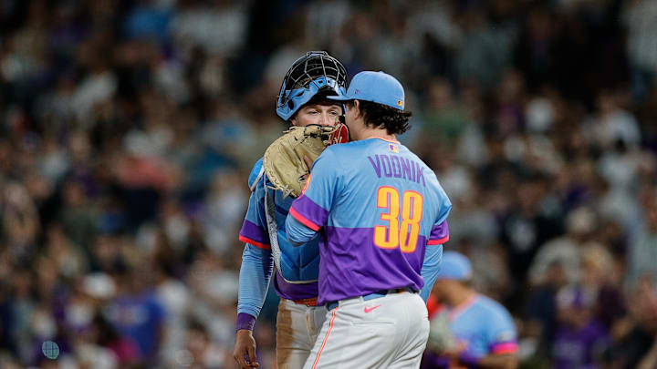 Sep 19, 2025; Denver, Colorado, USA; Colorado Rockies catcher Hunter Goodman (15) talks with relief pitcher Victor Vodnik (38) in the ninth inning against the Los Angeles Angels at Coors Field. Sep 19, 2025; Denver, Colorado, USA; Colorado Rockies catcher Hunter Goodman (15) talks with relief pitcher Victor Vodnik (38) in the ninth inning against the Los Angeles Angels at Coors Field.