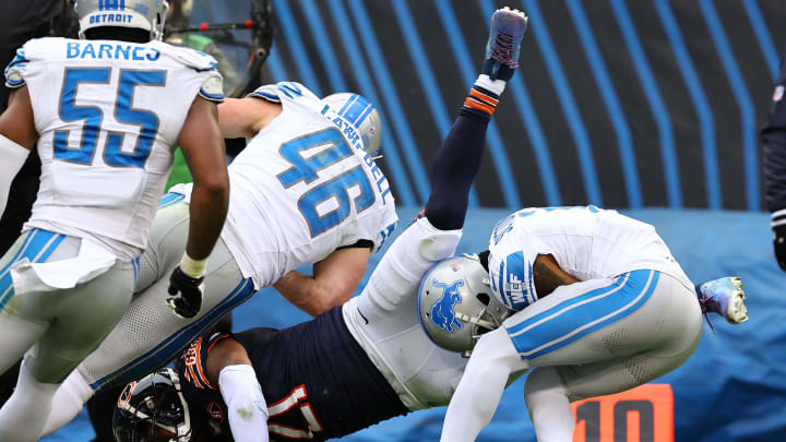 Detroit Lions linebacker Jack Campbell (46) makes a tackle on Chicago Bears running back D'Onta Foreman 