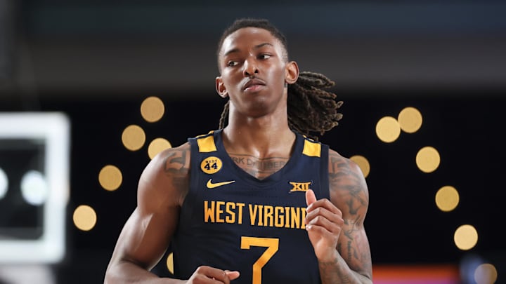 Nov 28, 2024; Paradise Island, Bahamas, BHS;  West Virginia Mountaineers guard Javon Small (7) reacts during the second half against the Louisville Cardinals at Imperial Arena at the Atlantis resort.  Mandatory Credit: Kevin Jairaj-Imagn Images