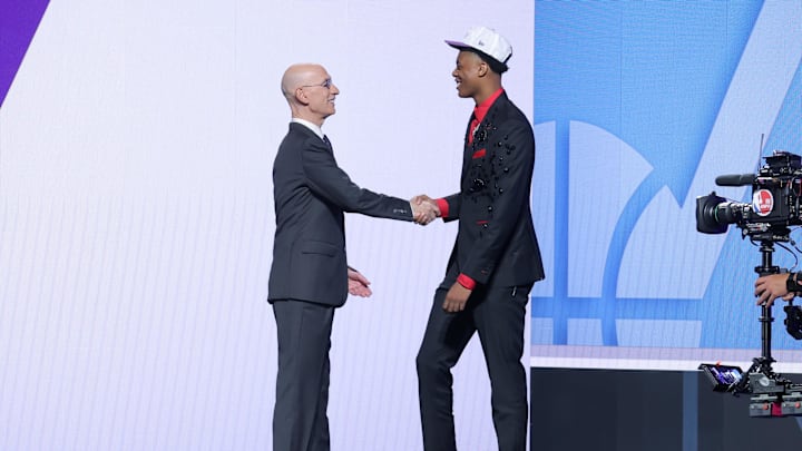 Jun 25, 2025; Brooklyn, NY, USA;  Ace Bailey shakes hands with NBA commissioner Adam Silver after being selected as the fifth pick by the Utah Jazz in the first round of the 2025 NBA Draft at Barclays Center. Mandatory Credit: Brad Penner-Imagn Images