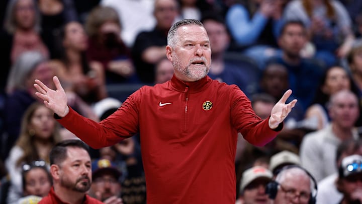 Mar 24, 2025; Denver, Colorado, USA; Denver Nuggets head coach Michael Malone gestures in the third quarter against the Chicago Bulls at Ball Arena. Mandatory Credit: Isaiah J. Downing-Imagn Images