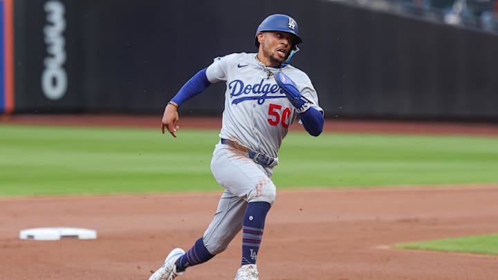 Mookie Betts runs the bases against the Mets.