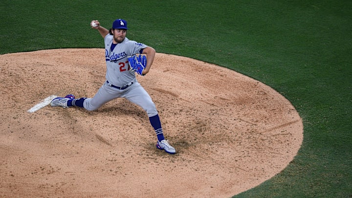 Los Angeles Dodgers starting pitcher Trevor Bauer (27) throws a pitch against the San Diego Padres during the fourth inning at Petco Park in 2021. Los Angeles Dodgers starting pitcher Trevor Bauer (27) throws a pitch against the San Diego Padres during the fourth inning at Petco Park in 2021.