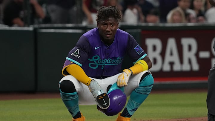 Jun 27, 2025; Phoenix, Arizona, USA; Arizona Diamondbacks shortstop Geraldo Perdomo (2) sits on thirdbase in the ninth inning against the Miami Marlins at Chase Field. Mandatory Credit: Rick Scuteri-Imagn Images Jun 27, 2025; Phoenix, Arizona, USA; Arizona Diamondbacks shortstop Geraldo Perdomo (2) sits on thirdbase in the ninth inning against the Miami Marlins at Chase Field. Mandatory Credit: Rick Scuteri-Imagn Images