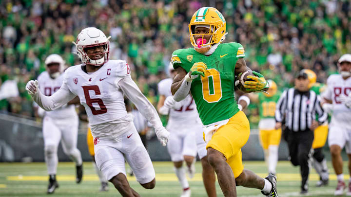 Oregon running back Bucky Irving rushes for a touchdown as the No. 9 Oregon Ducks host Washington