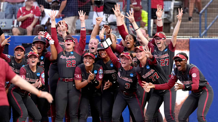Oklahoma celebrates Abby Dayton's 2-run home run in the seventh inning of the Women's College World Series softball game between the Texas Tech Raiders and the Oklahoma Sooners at Devon Park in Oklahoma City, Monday, June, 2, 2025.