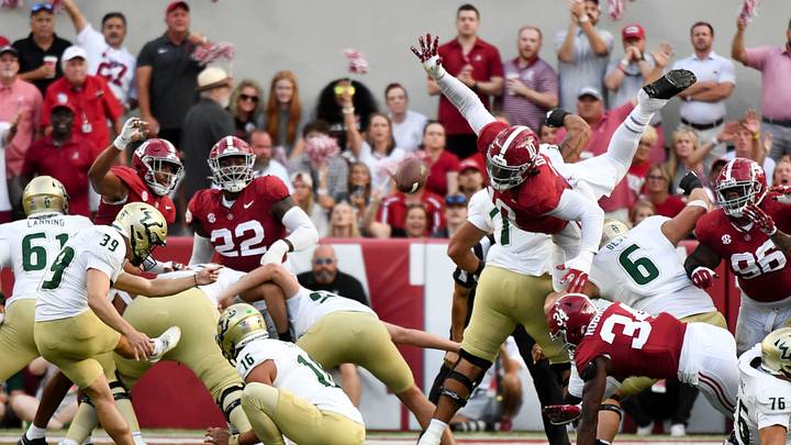 Sep 7, 2024; Tuscaloosa, Alabama, USA; South Florida Bulls place kicker John Cannon (39) kicks a field goal against Alabama Crimson Tide defensive lineman Jehiem Oatis (10) during the first half at Bryant-Denny Stadium. Mandatory Credit: Gary Cosby Jr.-Imagn Images Sep 7, 2024; Tuscaloosa, Alabama, USA; South Florida Bulls place kicker John Cannon (39) kicks a field goal against Alabama Crimson Tide defensive lineman Jehiem Oatis (10) during the first half at Bryant-Denny Stadium. Mandatory Credit: Gary Cosby Jr.-Imagn Images