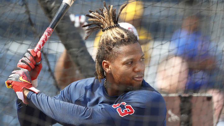 May 24, 2024; Pittsburgh, Pennsylvania, USA;  Atlanta Braves right fielder Ronald Acuna Jr. (13) in the batting cage before the game against the Pittsburgh Pirates at PNC Park. Mandatory Credit: Charles LeClaire-Imagn Images