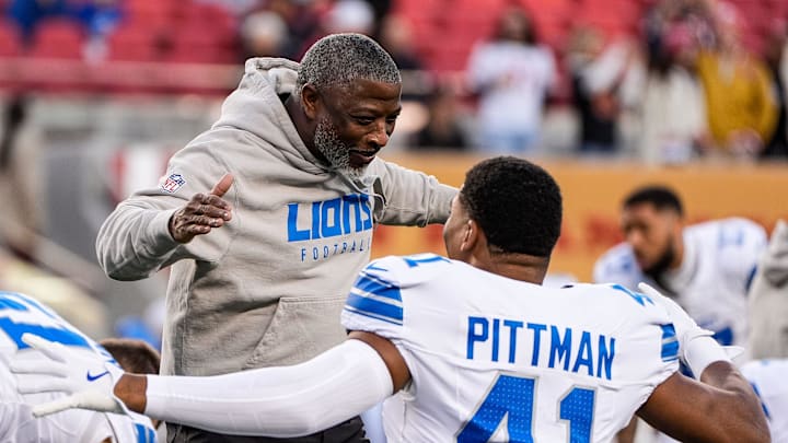 Detroit Lions defensive coordinator Aaron Glenn hugs linebacker Anthony Pittman during warmups before the game against the San Francisco 49ers at Levi's Stadium in Santa Clara, Calif. on Monday, Dec. 30, 2024.