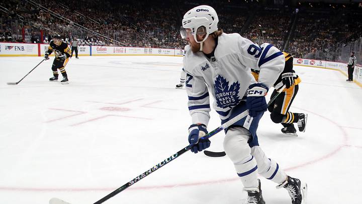 Dec 7, 2024; Pittsburgh, Pennsylvania, USA;  Toronto Maple Leafs left wing Alex Nylander (92) moves the puck against the Pittsburgh Penguins during the first period at PPG Paints Arena. Mandatory Credit: Charles LeClaire-Imagn Images