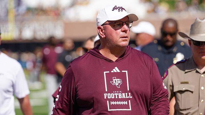 Texas A&M Aggies head coach Mike Elko leaves the field after the first half against the Missouri Tigers during the first half of the game at Faurot Field at Memorial Stadium. Texas A&M Aggies head coach Mike Elko leaves the field after the first half against the Missouri Tigers during the first half of the game at Faurot Field at Memorial Stadium.