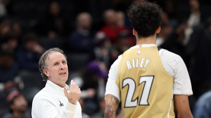 Feb 1, 2026; Washington, District of Columbia, USA; Washington Wizards head coach Brian Keefe converses with Washington Wizards guard Will Riley (27) during the second half against the Sacramento Kings at Capital One Arena. Mandatory Credit: Daniel Kucin Jr.-Imagn Images