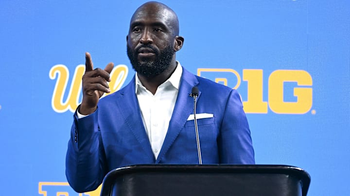 Jul 24, 2024; Indianapolis, IN, USA; UCLA Bruins head coach DeShaun Foster speaks to the media during the Big 10 football media day at Lucas Oil Stadium. Mandatory Credit: Robert Goddin-Imagn Images Jul 24, 2024; Indianapolis, IN, USA; UCLA Bruins head coach DeShaun Foster speaks to the media during the Big 10 football media day at Lucas Oil Stadium. Mandatory Credit: Robert Goddin-Imagn Images