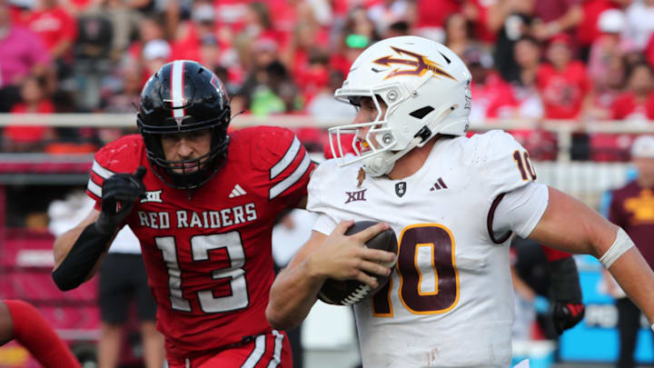 Sep 21, 2024; Lubbock, Texas, USA;  Texas Tech Red Raiders defensive back Ben Roberts (13) pressures Arizona State Sun Devils quarterback Sam Leavitt (10) in the second half at Jones AT&T Stadium and Cody Campbell Field. Mandatory Credit: Michael C. Johnson-Imagn Images