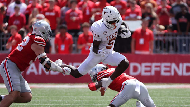 Aug 30, 2025; Columbus, Ohio, USA; Texas Longhorns running back Quintrevion Wisner (5) rushes the ball against the Ohio State Buckeyes in the first half at Ohio Stadium. Mandatory Credit: Joseph Maiorana-Imagn Images