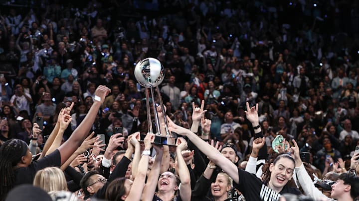 The Liberty celebrate after winning the 2024 WNBA Finals over the Lynx.