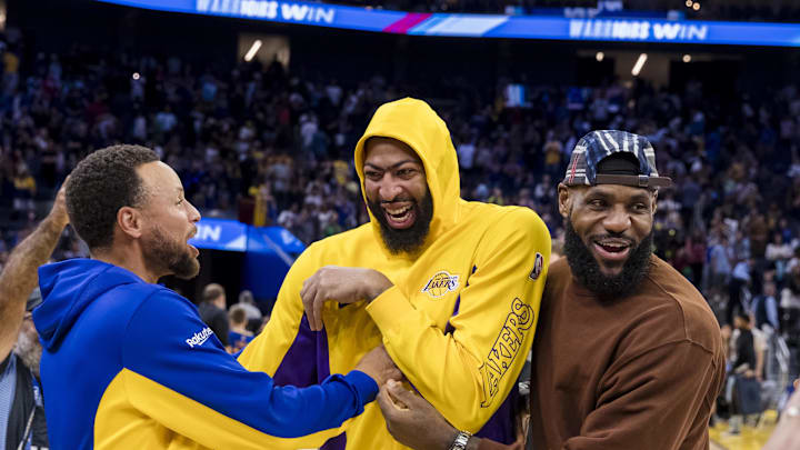 Oct 7, 2023; San Francisco, California, USA;  Golden State Warriors guard Stephen Curry (30) and Los Angeles Lakers center Anthony Davis (3) and forward LeBron James (23) laugh after a game at Chase Center. Mandatory Credit: John Hefti-USA TODAY Sports