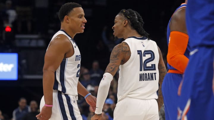 Oct 19, 2022; Memphis, Tennessee, USA; Memphis Grizzlies guard Desmond Bane (22) and guard Ja Morant (12) react after a basket during the second half against the New York Knicks at FedExForum. Mandatory Credit: Petre Thomas-USA TODAY Sports Oct 19, 2022; Memphis, Tennessee, USA; Memphis Grizzlies guard Desmond Bane (22) and guard Ja Morant (12) react after a basket during the second half against the New York Knicks at FedExForum. Mandatory Credit: Petre Thomas-USA TODAY Sports