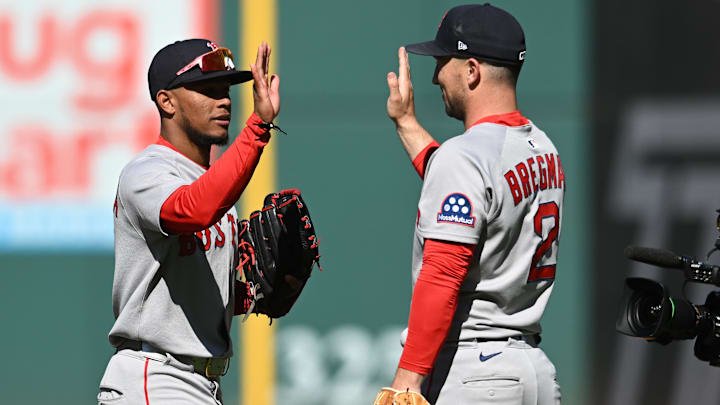 Apr 27, 2025; Cleveland, Ohio, USA; Boston Red Sox center fielder Ceddanne Rafaela (3) and third baseman Alex Bregman (2) celebrate after the Red Sox beat the Cleveland Guardians at Progressive Field. Mandatory Credit: Ken Blaze-Imagn Images