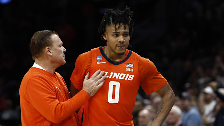 Mar 30, 2024; Boston, MA, USA; Illinois Fighting Illini head coach Brad Underwood reacts with guard Terrence Shannon Jr. (0) against the Connecticut Huskies in the finals of the East Regional of the 2024 NCAA Tournament at TD Garden. Mandatory Credit: Winslow Townson-Imagn Images