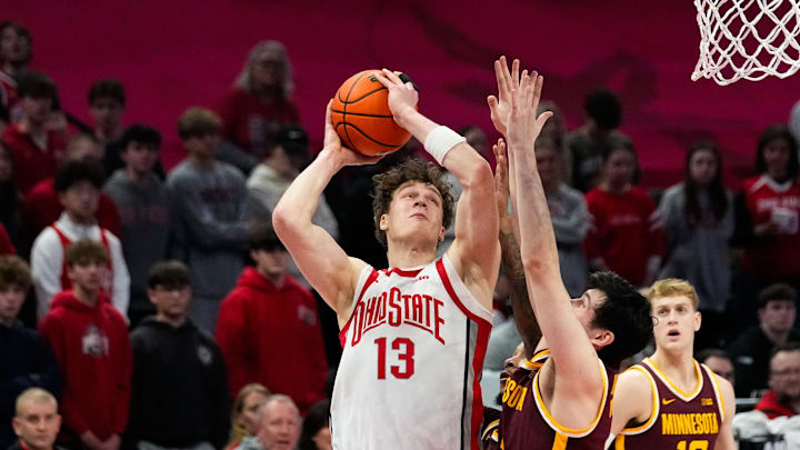 Ohio State Buckeyes center Christoph Tilly (13) shoots the ball against Minnesota Golden Gophers forward Bobby Durkin (3) in the second half of the NCAA basketball game at Value City Arena on Tuesday, Jan. 20, 2026 in Columbus, Ohio. Ohio State Buckeyes center Christoph Tilly (13) shoots the ball against Minnesota Golden Gophers forward Bobby Durkin (3) in the second half of the NCAA basketball game at Value City Arena on Tuesday, Jan. 20, 2026 in Columbus, Ohio.