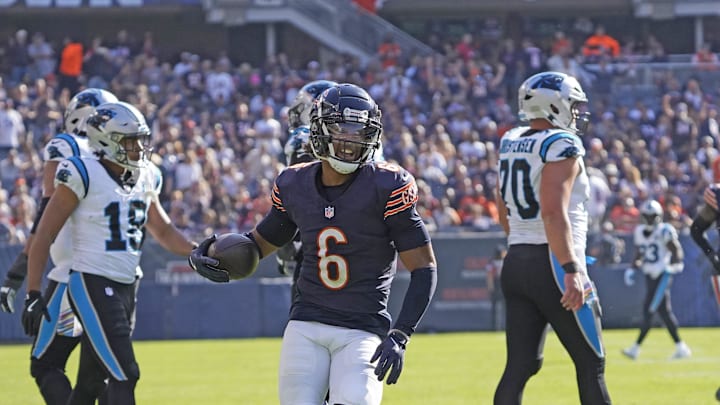 Cornerback Kyler Gordon recovers a fumble against the Carolina Panthers. 