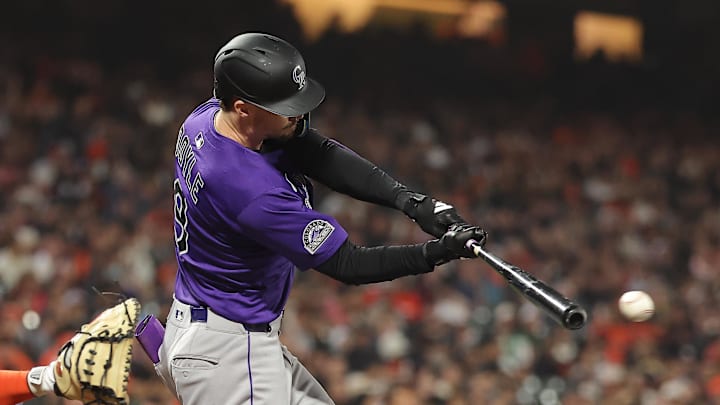 Colorado Rockies center fielder Brenton Doyle hits the ball