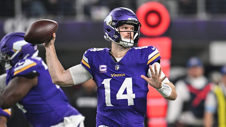 Nov 3, 2024; Minneapolis, Minnesota, USA; Minnesota Vikings quarterback Sam Darnold (14) throws a pass against the Indianapolis Colts during the first quarter at U.S. Bank Stadium.