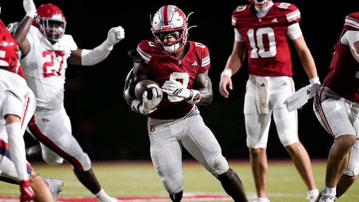 Baylor's David Gabriel Georges (0) runs the ball against Brentwood Academy during the first half at Baylor in Chattanooga, Tenn., Thursday, Aug. 20, 2026.