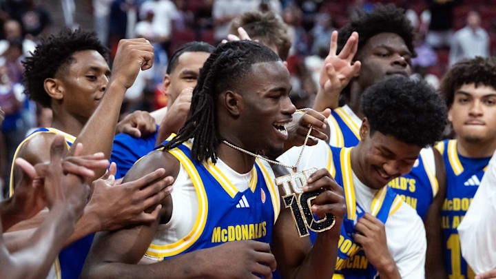 Mar 31, 2026; Glendale, AZ, USA; Caleb Holt (3) celebrates with teammates during the McDonalds All American Boys Game at Desert Diamond Arena. Mandatory Credit: Mark J. Rebilas-Imagn Images