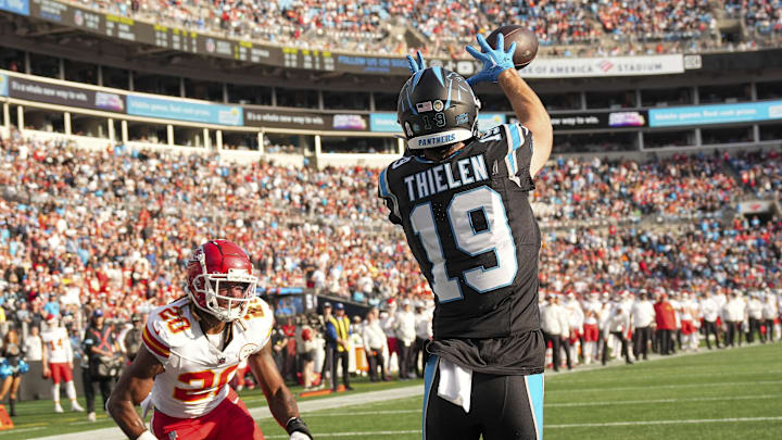 Nov 24, 2024; Charlotte, North Carolina, USA; Carolina Panthers wide receiver Adam Thielen (19) tries for a two point catch defended by Kansas City Chiefs safety Justin Reid (20) during the second half at Bank of America Stadium. Mandatory Credit: Jim Dedmon-Imagn Images Nov 24, 2024; Charlotte, North Carolina, USA; Carolina Panthers wide receiver Adam Thielen (19) tries for a two point catch defended by Kansas City Chiefs safety Justin Reid (20) during the second half at Bank of America Stadium. Mandatory Credit: Jim Dedmon-Imagn Images