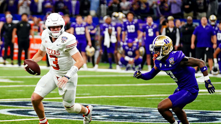 Jan 1, 2024; New Orleans, LA, USA; Texas Longhorns quarterback Quinn Ewers (3) is pressured by Washington Huskies safety Mishael Powell (3) during the fourth quarter in the 2024 Sugar Bowl college football playoff semifinal game at Caesars Superdome. Mandatory Credit: John David Mercer-Imagn Images Jan 1, 2024; New Orleans, LA, USA; Texas Longhorns quarterback Quinn Ewers (3) is pressured by Washington Huskies safety Mishael Powell (3) during the fourth quarter in the 2024 Sugar Bowl college football playoff semifinal game at Caesars Superdome. Mandatory Credit: John David Mercer-Imagn Images