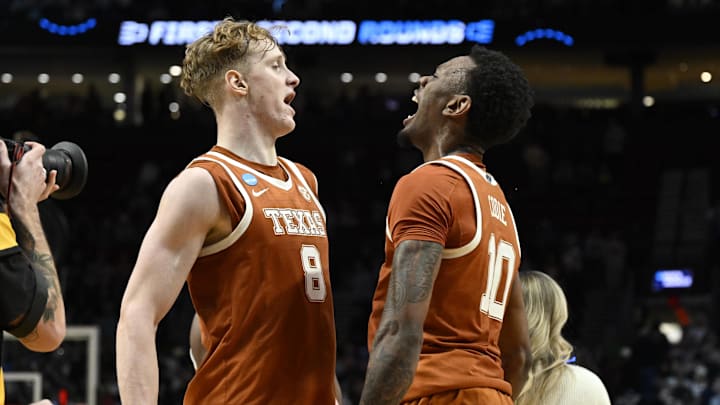 Texas Longhorns center Matas Vokietaitis (8) and forward Nic Codie (10) react after defeating the Gonzaga Bulldogs.