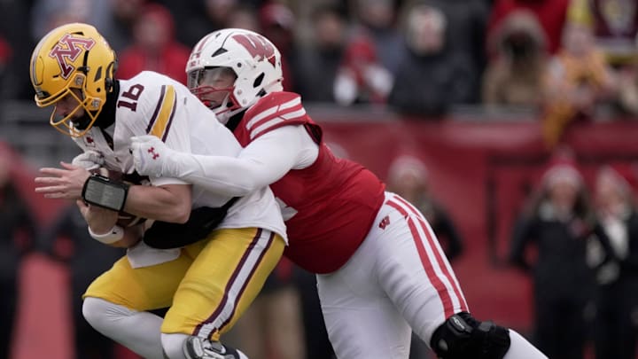 Wisconsin defensive lineman Elijah Hills (94) sacks Minnesota quarterback Max Brosmer (16) during the second quarter of their game at Camp Randall Stadium Friday, November 29, 2024 in Madison, Wisconsin.
Mark Hoffman/Milwaukee Journal Sentinel Wisconsin defensive lineman Elijah Hills (94) sacks Minnesota quarterback Max Brosmer (16) during the second quarter of their game at Camp Randall Stadium Friday, November 29, 2024 in Madison, Wisconsin.
Mark Hoffman/Milwaukee Journal Sentinel