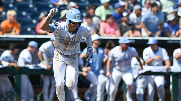 Jun 14, 2024; Omaha, NE, USA; North Carolina Tar Heels center fielder Vance Honeycutt (7) celebrates after driving in the winning run against the Virginia Cavaliers during the ninth inning at Charles Schwab Filed Omaha. Mandatory Credit: Steven Branscombe-USA TODAY Sports Jun 14, 2024; Omaha, NE, USA; North Carolina Tar Heels center fielder Vance Honeycutt (7) celebrates after driving in the winning run against the Virginia Cavaliers during the ninth inning at Charles Schwab Filed Omaha. Mandatory Credit: Steven Branscombe-USA TODAY Sports