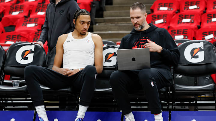 Noa Essengue of the Chicago Bulls looks on from the bench. Noa Essengue of the Chicago Bulls looks on from the bench.