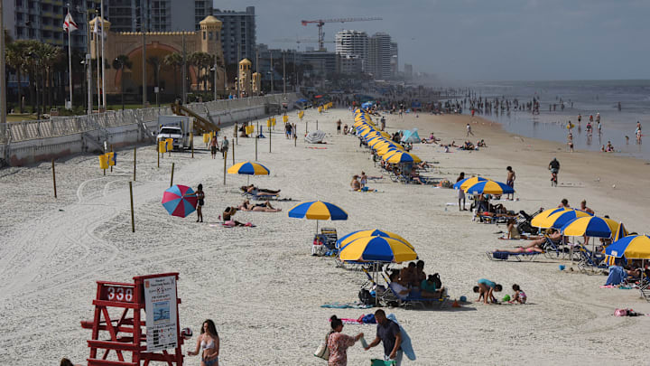 People enjoy warm temperatures during spring break at...