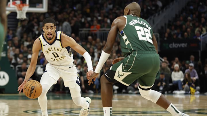 Jan 1, 2024; Milwaukee, Wisconsin, USA; Indiana Pacers guard Tyrese Haliburton (0) brings the ball
