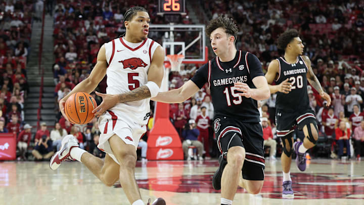 Jan 14, 2026; Fayetteville, Arkansas, USA; Arkansas Razorbacks guard Darius Acuff Jr (5) drives during the first half against South Carolina Gamecocks guard Eli Ellis (15) at Bud Walton Arena. Mandatory Credit: Nelson Chenault-Imagn Images Jan 14, 2026; Fayetteville, Arkansas, USA; Arkansas Razorbacks guard Darius Acuff Jr (5) drives during the first half against South Carolina Gamecocks guard Eli Ellis (15) at Bud Walton Arena. Mandatory Credit: Nelson Chenault-Imagn Images