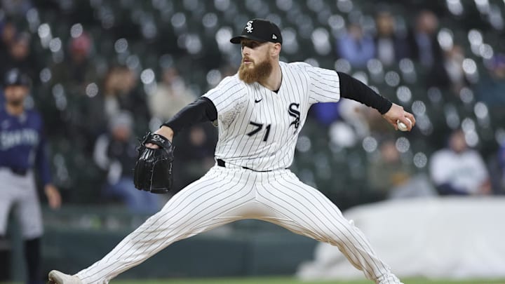 May 19, 2025; Chicago, Illinois, USA; Chicago White Sox relief pitcher Cam Booser (71) delivers a pitch against the Seattle Mariners during the eight inning at Rate Field. Mandatory Credit: Kamil Krzaczynski-Imagn Images