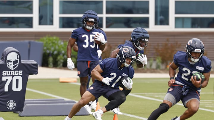 Jun 3, 2025; Lake Forest, IL, USA; Chicago Bears running back Travis Homer (21) runs with the ball during minicamp at Halas Hall. Mandatory Credit: Kamil Krzaczynski-Imagn Images