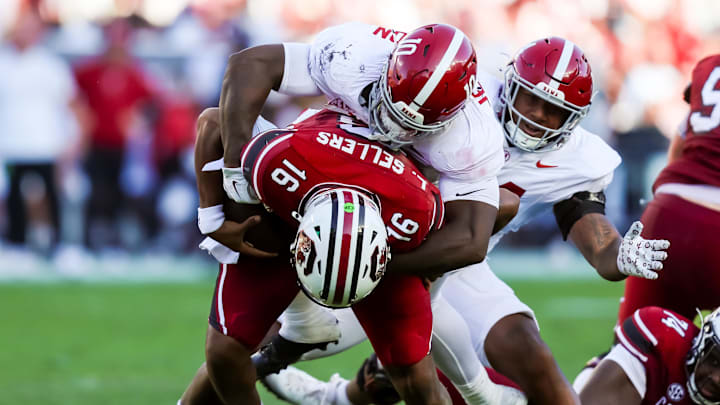 Oct 25, 2025; Columbia, South Carolina, USA; Alabama Crimson Tide linebacker Justin Jefferson (10) sacks South Carolina Gamecocks quarterback Lanorris Sellers (16) in the second quarter at Williams-Brice Stadium. Mandatory Credit: Jeff Blake-Imagn Images