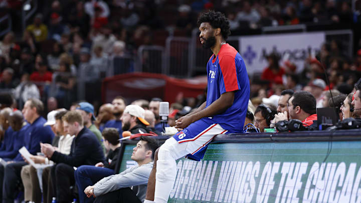 Dec 8, 2024; Chicago, Illinois, USA; Philadelphia 76ers center Joel Embiid (21) waits to enter the game against the Chicago Bulls during the first half at United Center. Mandatory Credit: Kamil Krzaczynski-Imagn Images
