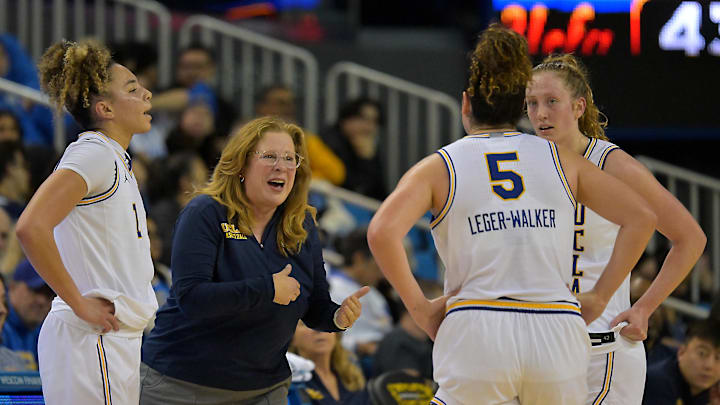 Jan 21, 2026; Los Angeles, California, USA;  UCLA Bruins head coach Cori Close talks with guard Kiki Rice (1), guard Charlisse Leger-Walker (5) and  guard Gianna Kneepkens (8) in the second half against the Purdue Boilermakers at Pauley Pavilion presented by Wescom Financial. Mandatory Credit: Jayne Kamin-Oncea-Imagn Images