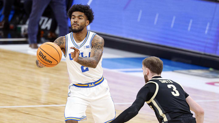 Mar 14, 2026; Chicago, IL, USA; UCLA Bruins guard Donovan Dent (2) passes the ball against Purdue Boilermakers guard Braden Smith (3) during the first half at United Center. Mandatory Credit: Kamil Krzaczynski-Imagn Images Mar 14, 2026; Chicago, IL, USA; UCLA Bruins guard Donovan Dent (2) passes the ball against Purdue Boilermakers guard Braden Smith (3) during the first half at United Center. Mandatory Credit: Kamil Krzaczynski-Imagn Images